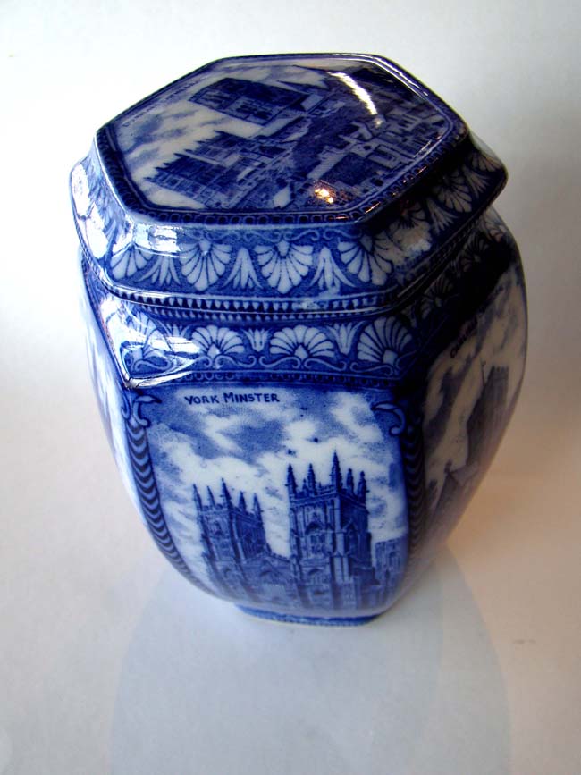 A beautiful late 19th century English porcelain biscuit jar made for Rington's Tea Merchants